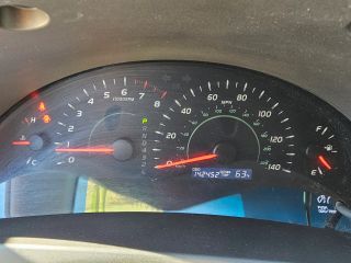 2009 Toyota Camry LE - Interior Dashboard With Vehicle Running Image